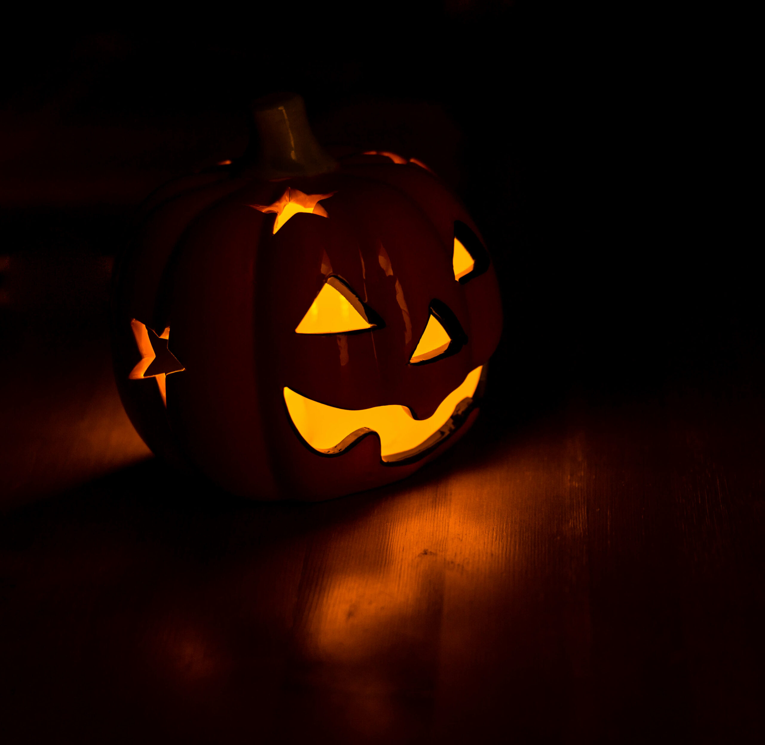 A Halloween pumpkin looks rather scary.